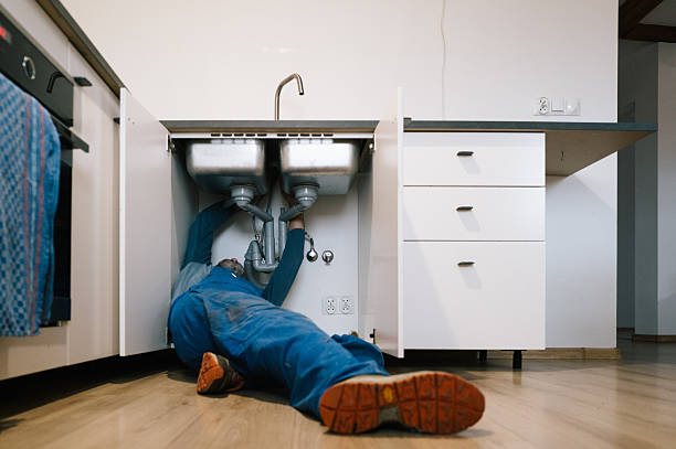 Professional Emergency Plumber technician working in Independence, WI